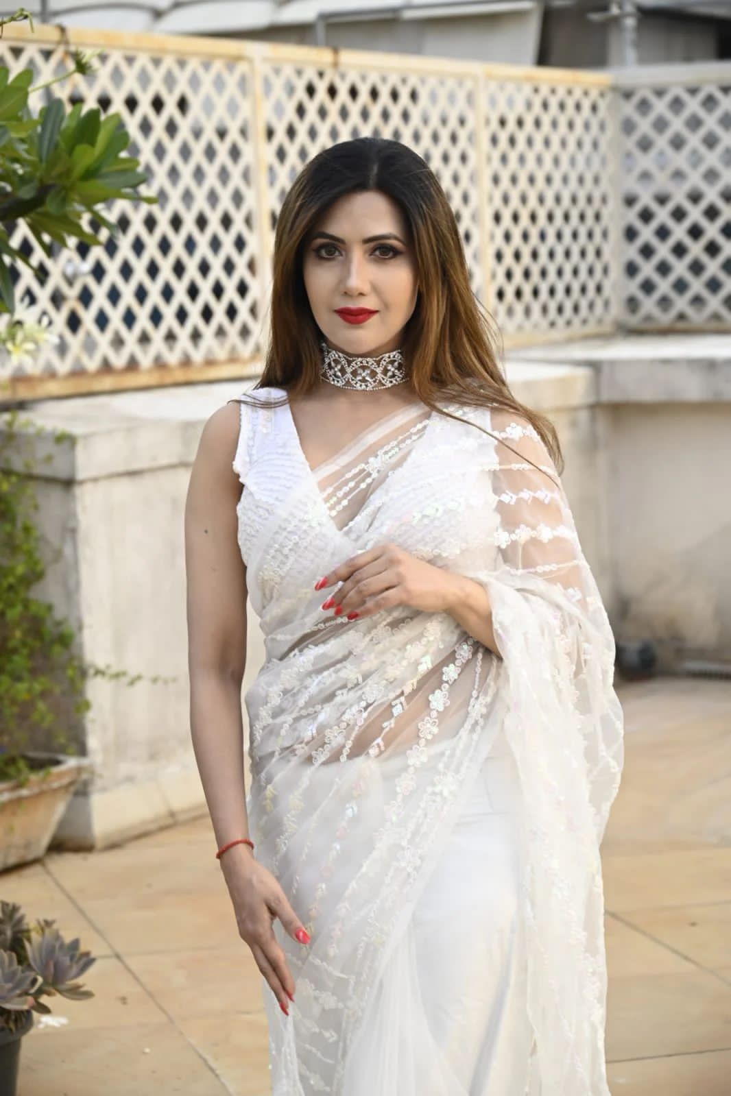 WHITE COLOR SEQUINS EMBROIDERY WORK WITH FANCY TASSLE BORDER SAREE