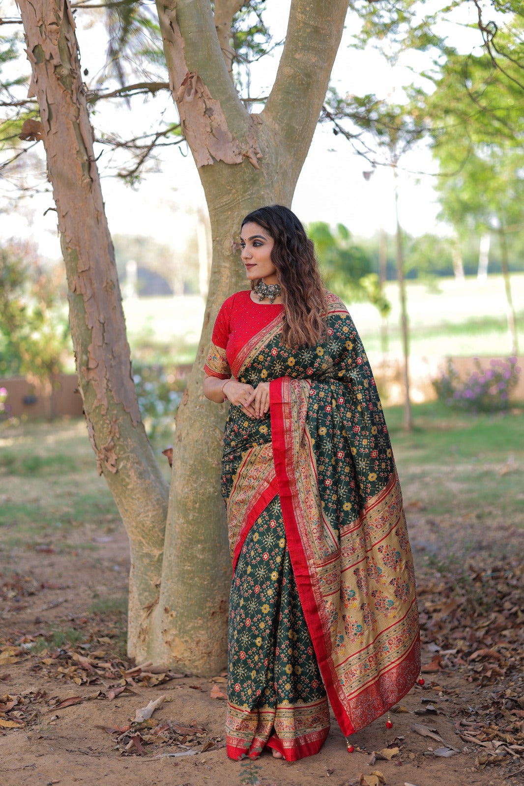 DARK GREEN DOLA SILK WITH FOIL PRINT EMBELLISHED STONE WORK SAREE