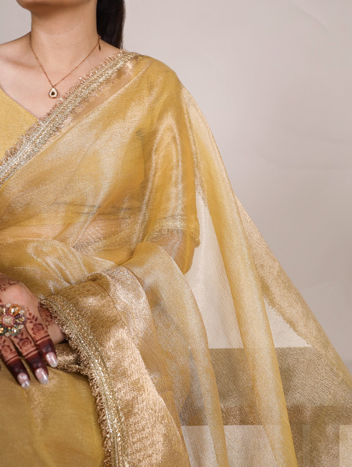 Golden Tissue Shimmer Zari With Sequins Lace Border Sare