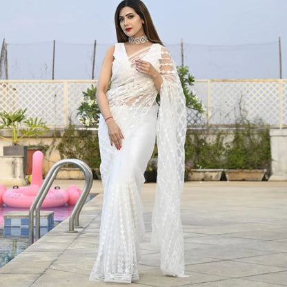 WHITE COLOR SEQUINS EMBROIDERY WORK WITH FANCY TASSLE BORDER SAREE