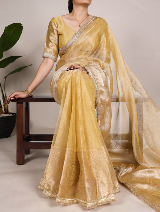 Golden Tissue Shimmer Zari With Sequins Lace Border Sare