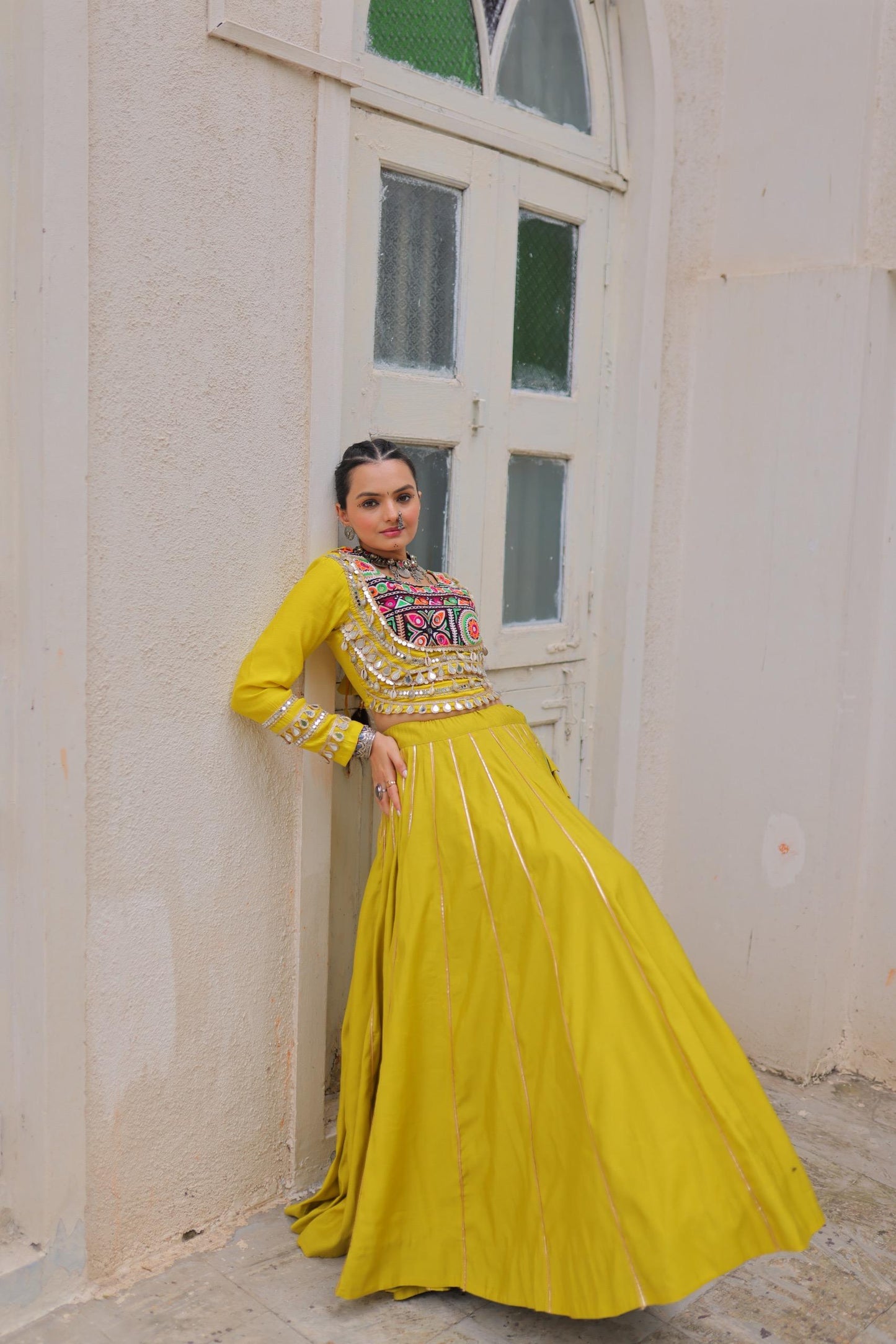 Yellow Roman with Attractive Gota-Patti Lace Lehenga Choli